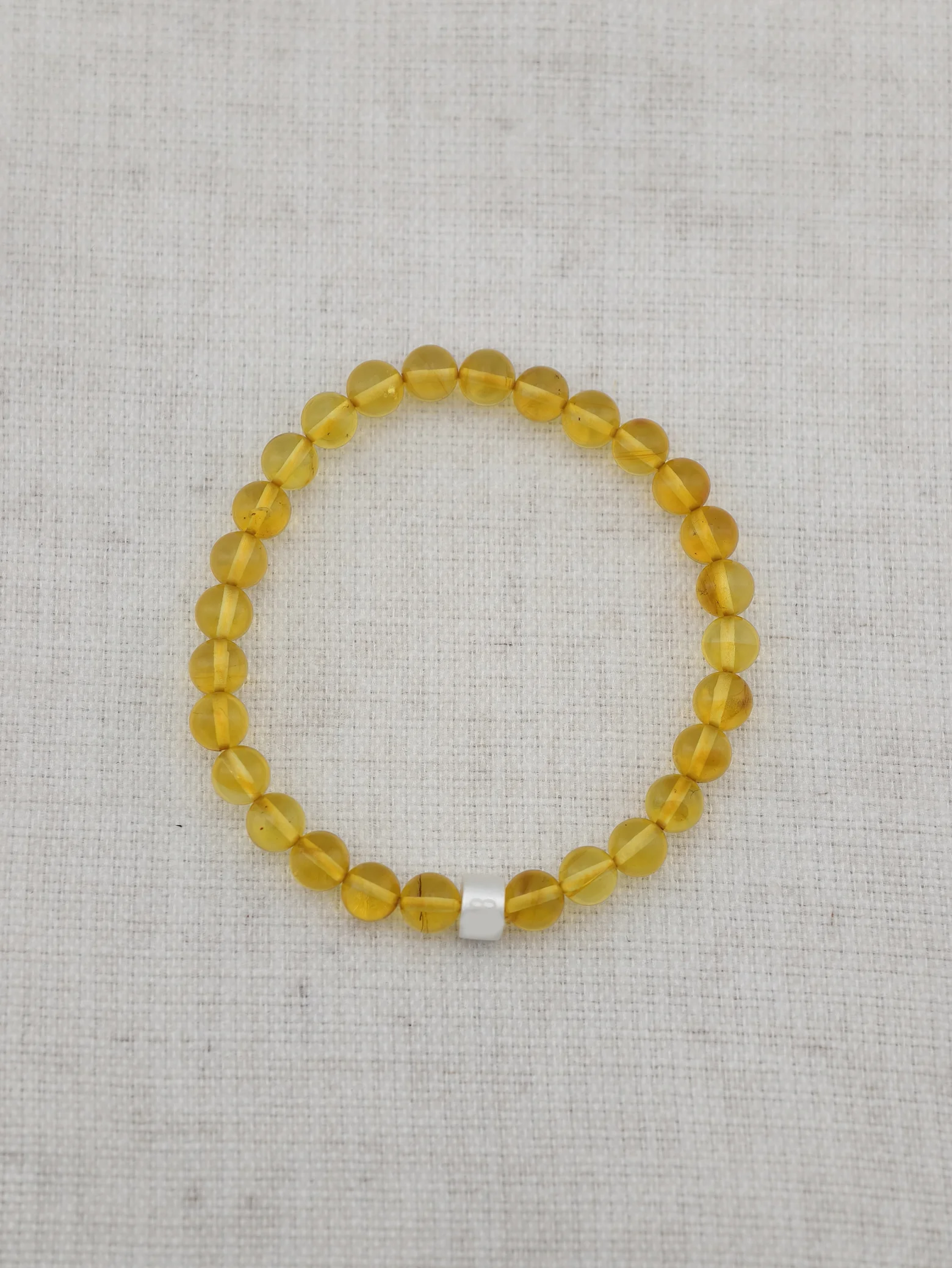 Goldener Bernstein-Armband mit 925er Silber Röhrchen