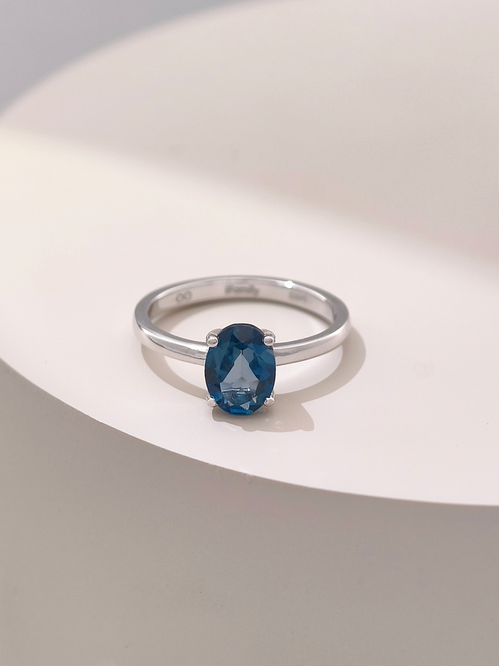 Anillo Solitario Topacio Azul Londres Natural Ovalada 6 x 8 mm 4 Garras Plata 925